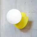 Verthara Frosted Globe Wrought Iron Wall Light