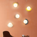 Verthara Frosted Globe Wrought Iron Wall Light