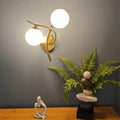 Verthara Modern Iron Wall Lamp with Glass Ball Shade – LED Wall Lights for Indoor Bedroom and Corridor Sconces Gold Left
